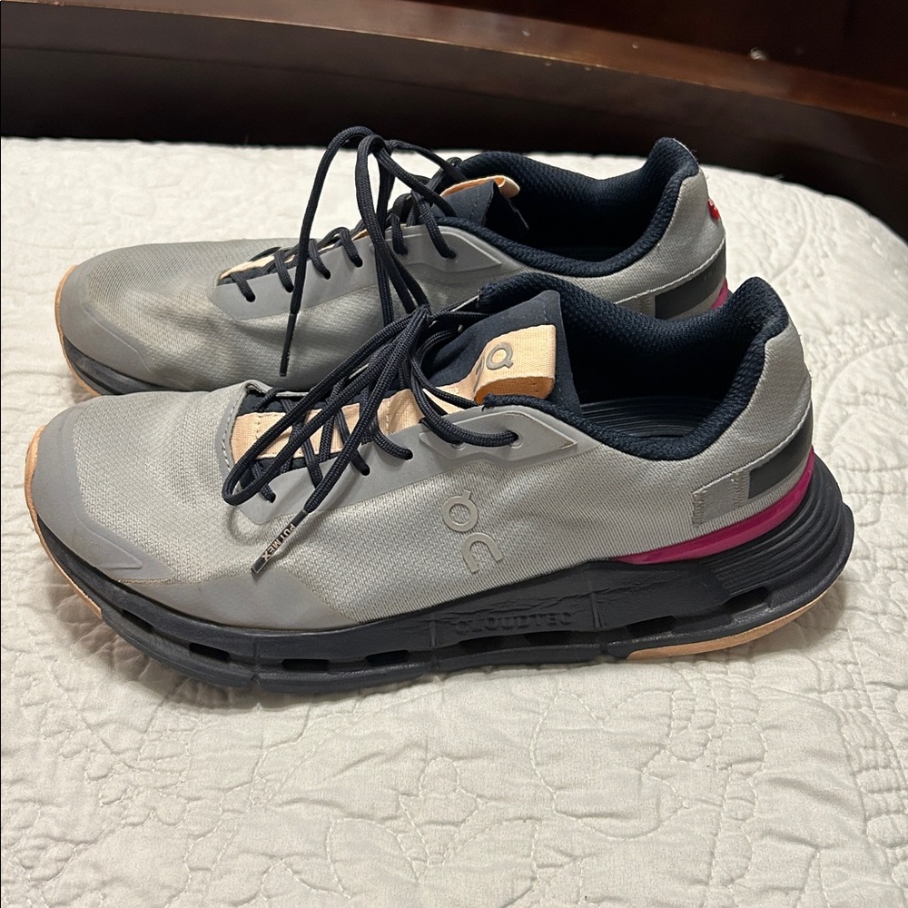 Navy Blue On Shoes with peach and pink accents.